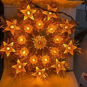 Vintage lighted star tree topper.  19 lights